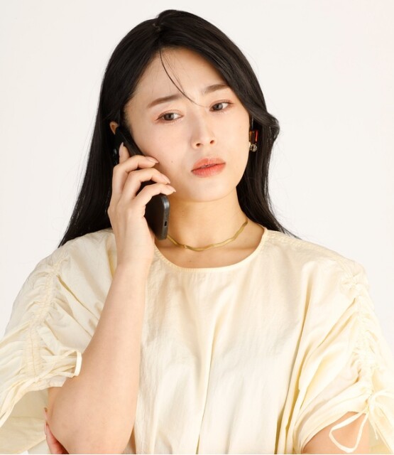 電話をしているところを撮ってもらう