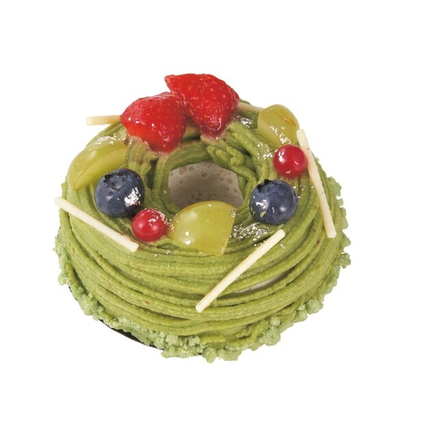 「クリスマス・リースケーキ 〜ピスタチオクリームのモンブラン仕立て〜」(900円)。緑のクリームで作られたリースにキュン